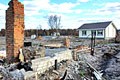 Около 500 семей погорельцев пока еще не получили новых домов
